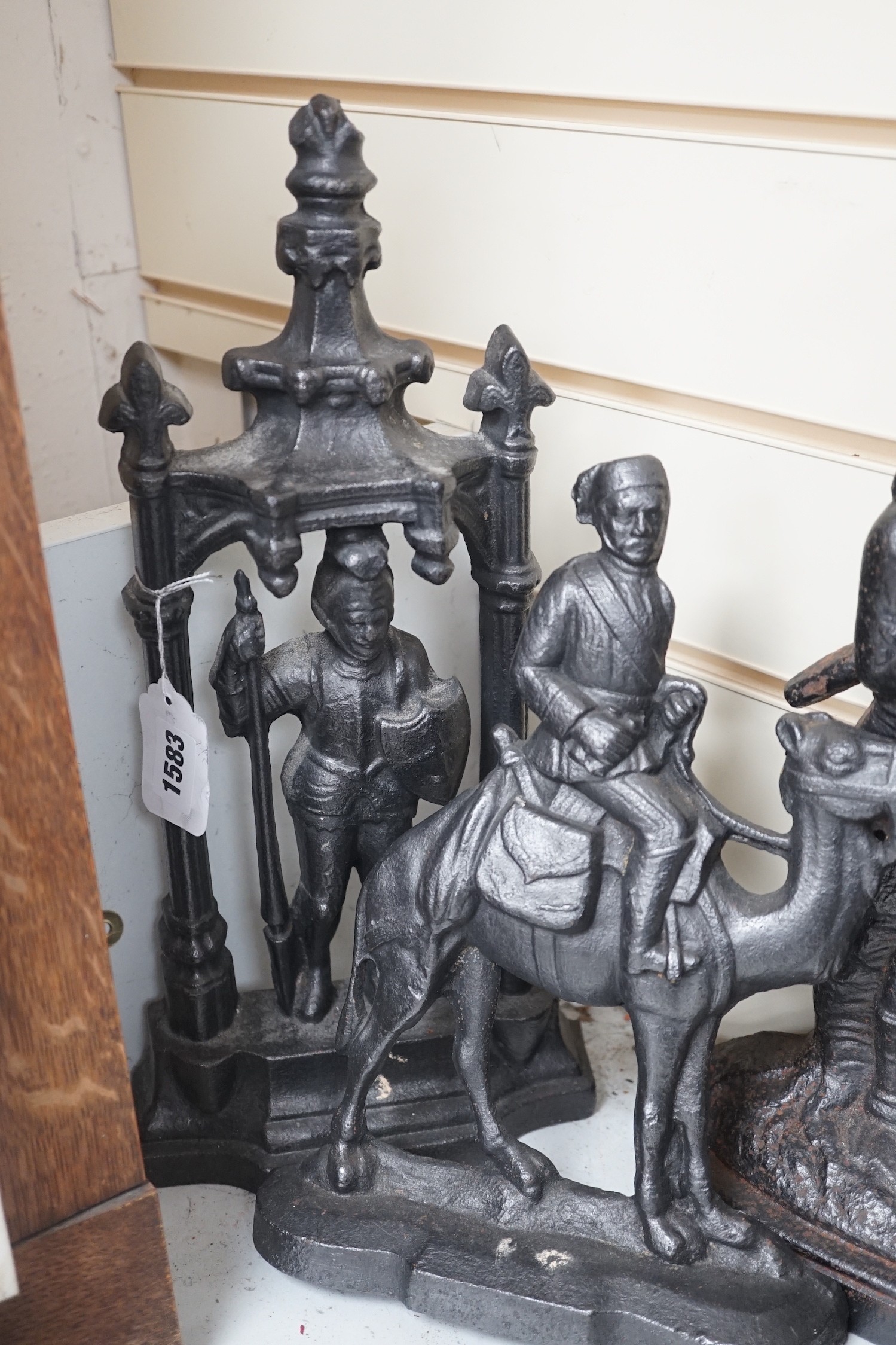 Three Victorian cast iron figural doorstops, 40cm